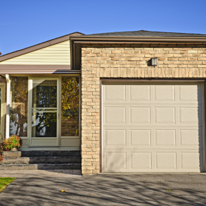 small house yellow brick garage needs renovation