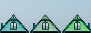 three roofs of houses showing three different ways to sell a house